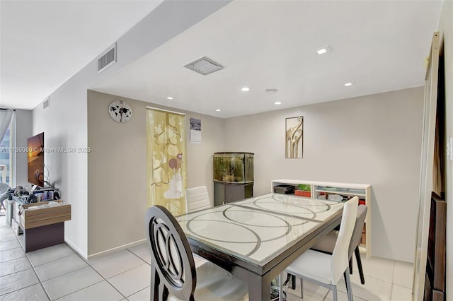 dining space featuring light tile patterned floors, baseboards, visible vents, and recessed lighting