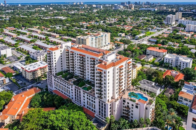 birds eye view of property with a view of city