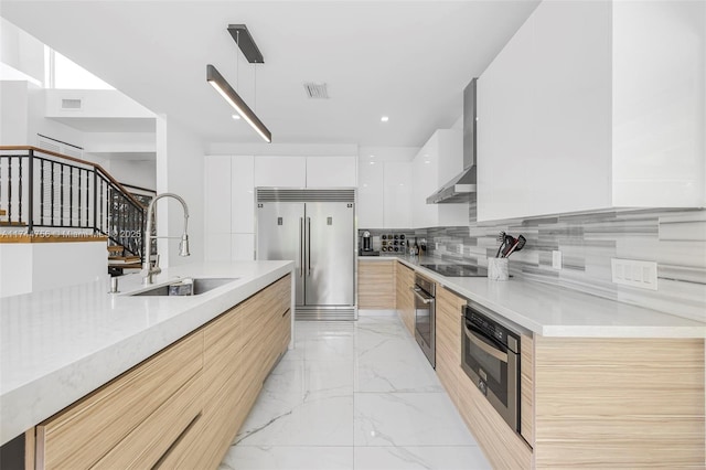 1651 SW 13th Ave, Miami, FL 33145 - kitchen with modern cabinets, visible vents, a sink, wall chimney exhaust hood, and stainless steel appliances