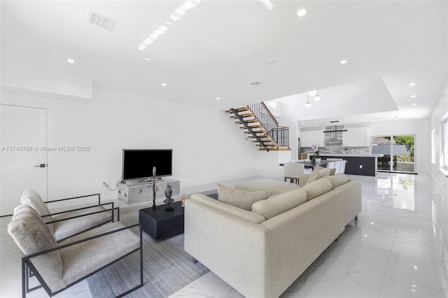 1651 SW 13th Ave, Miami, FL 33145 - living area with recessed lighting, visible vents, marble finish floor, and stairs