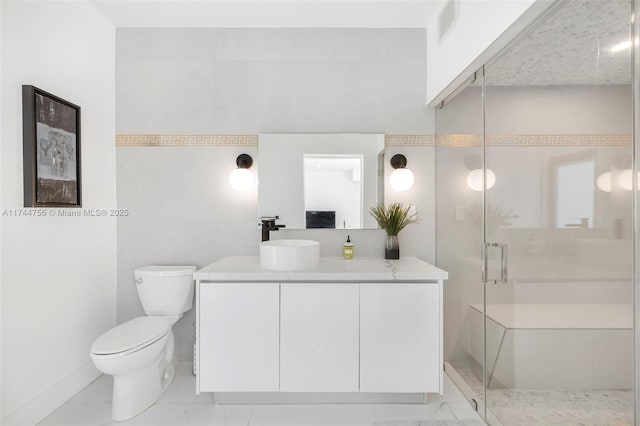 1651 SW 13th Ave, Miami, FL 33145 - full bath with a stall shower, toilet, vanity, baseboards, and tile patterned floors