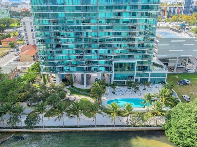 view of property featuring a view of city and a water view