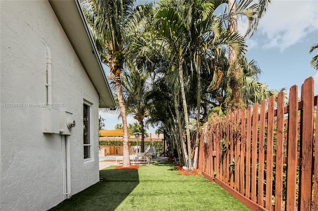 view of yard featuring fence