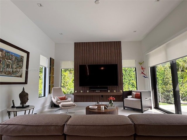 living room with visible vents and baseboards