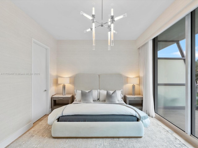 bedroom with a chandelier