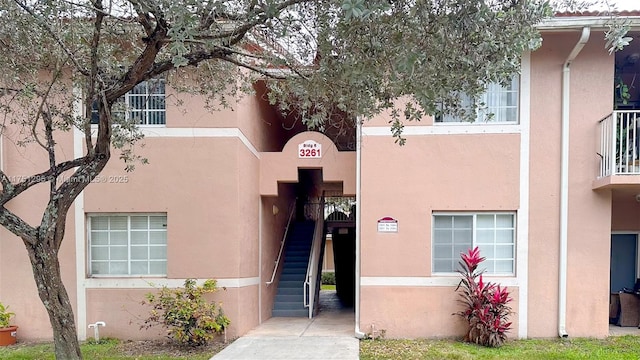 view of building exterior with stairway