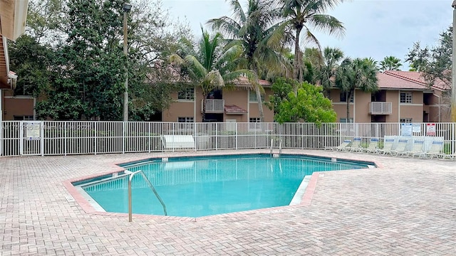 community pool with fence