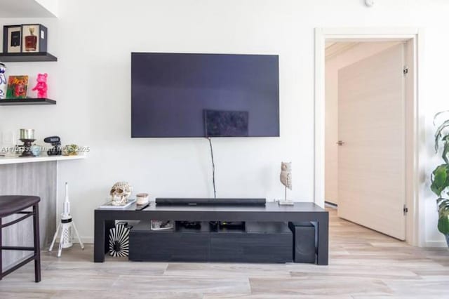 living area featuring light wood-style flooring