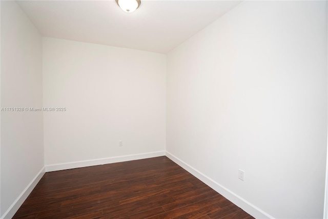 1300 Ponce De Leon Blvd Unit 709, Coral Gables, FL 33134 - unfurnished room with baseboards and dark wood-style flooring