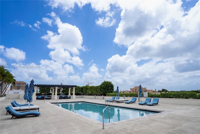 1300 Ponce De Leon Blvd Unit 709, Coral Gables, FL 33134 - community pool with a pergola and a patio area