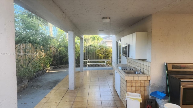 view of patio / terrace with a sink