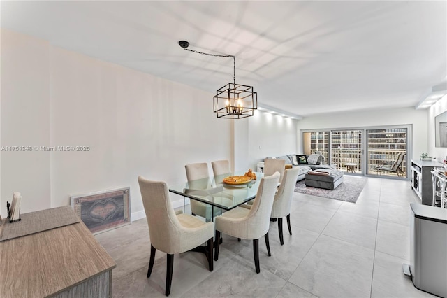 dining space with a chandelier