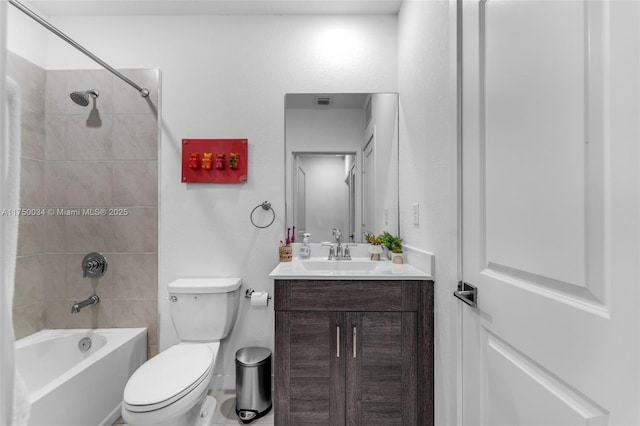 full bathroom with shower / bath combination, vanity, and toilet