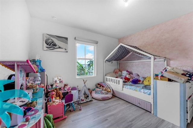 bedroom featuring light wood-type flooring