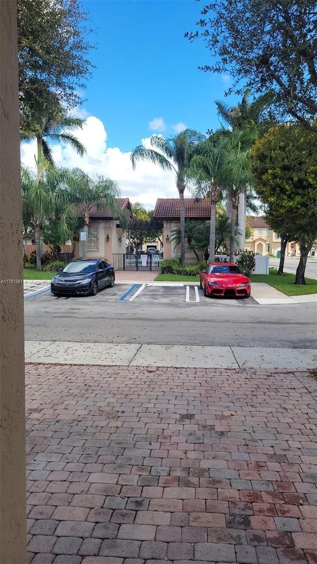 exterior space with curbs and sidewalks