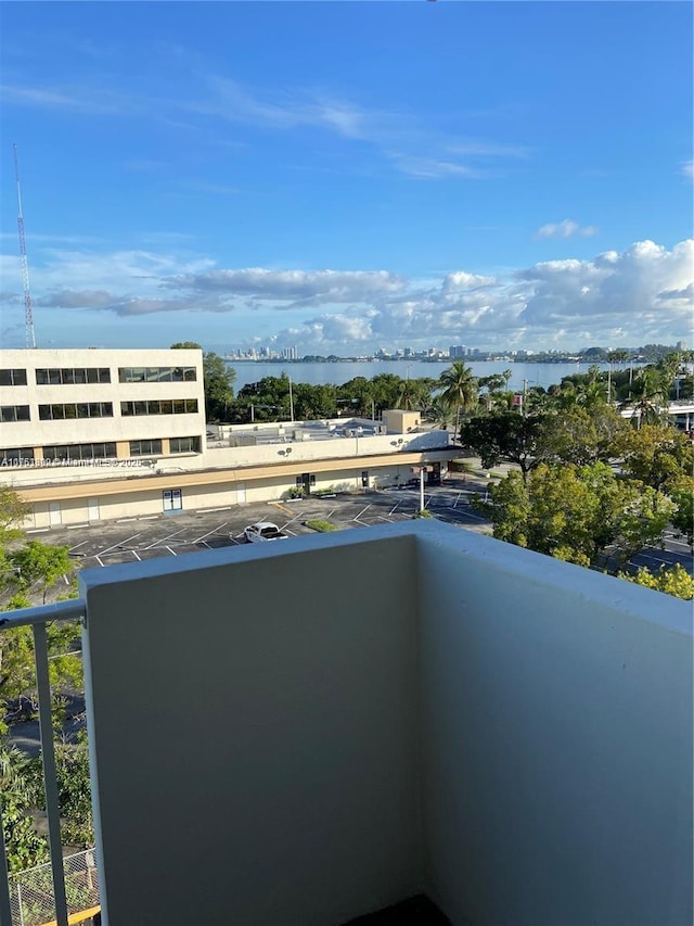 balcony featuring a water view