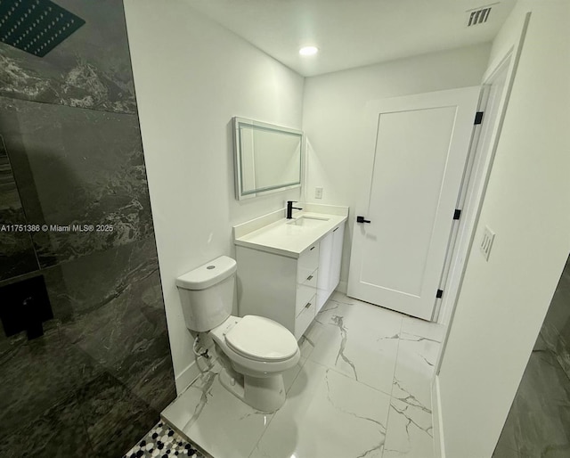 full bath featuring marble finish floor, visible vents, toilet, vanity, and walk in shower