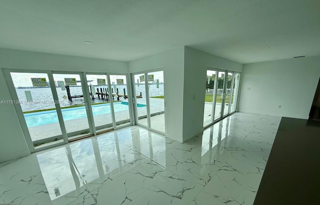 empty room featuring marble finish floor