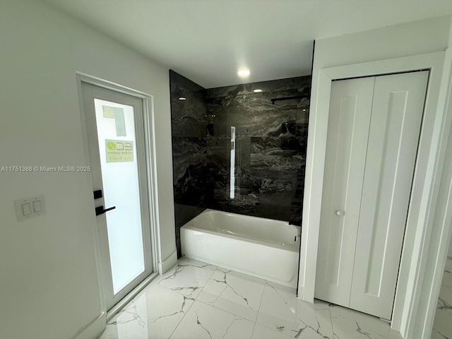 bathroom with a bathtub, marble finish floor, a closet, and walk in shower