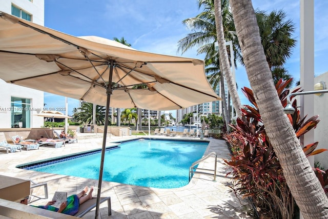 community pool with a patio