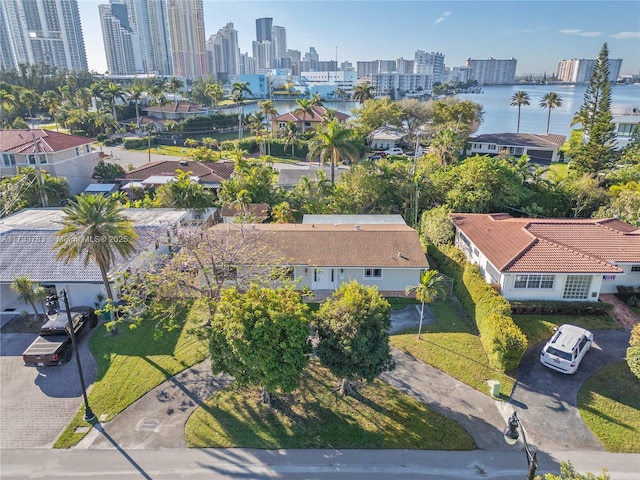 aerial view with a view of city and a water view