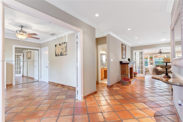 interior space featuring baseboards, french doors, recessed lighting, and crown molding