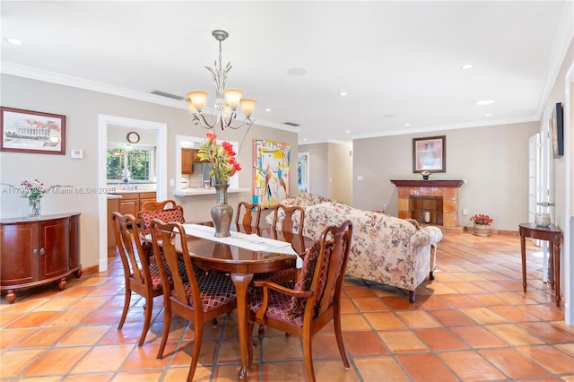 dining room featuring light tile patterned flooring, an inviting chandelier, and crown molding