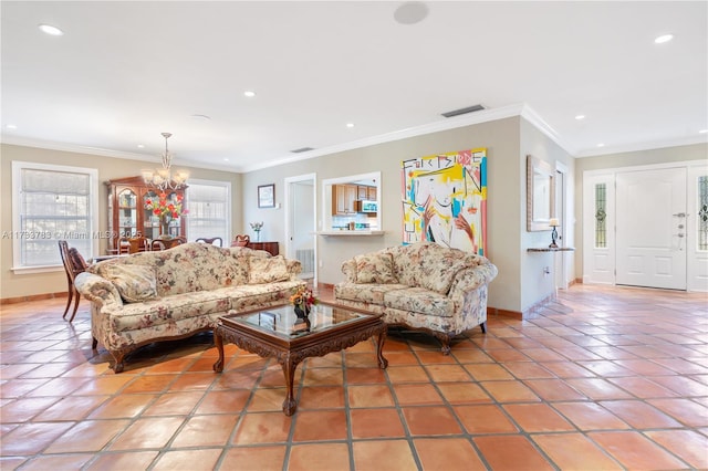 living room with recessed lighting, crown molding, an inviting chandelier, and light tile patterned floors