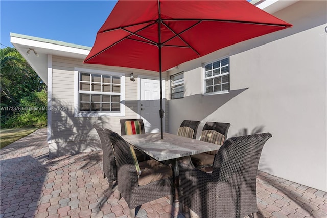 view of patio with outdoor dining space