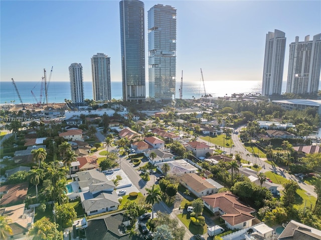 bird's eye view with a water view and a view of city