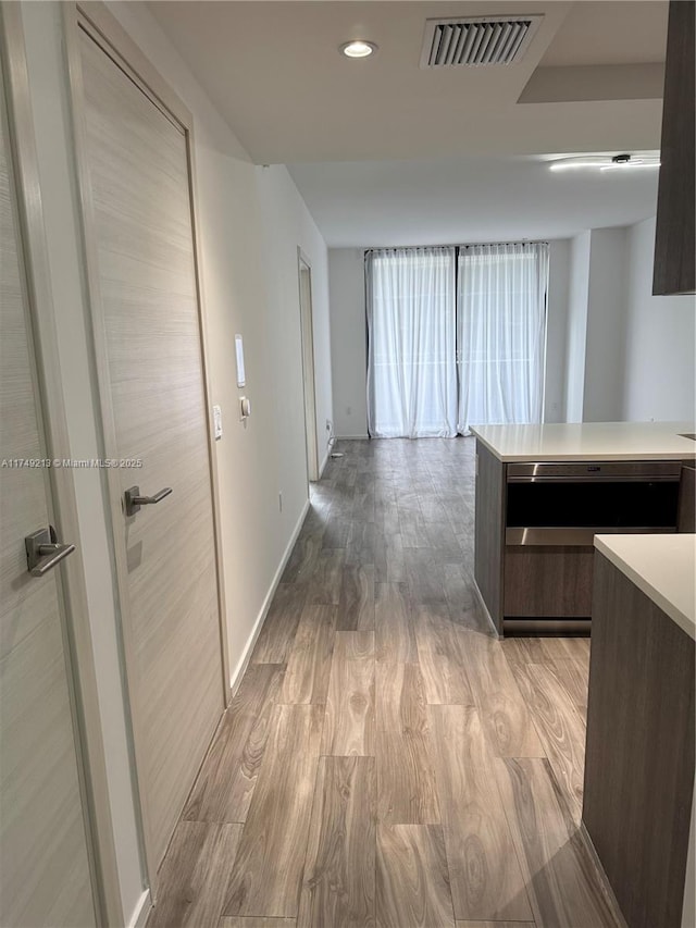 801 S Miami Ave Unit 1808, Miami, FL 33130 - hall featuring light wood finished floors and recessed lighting