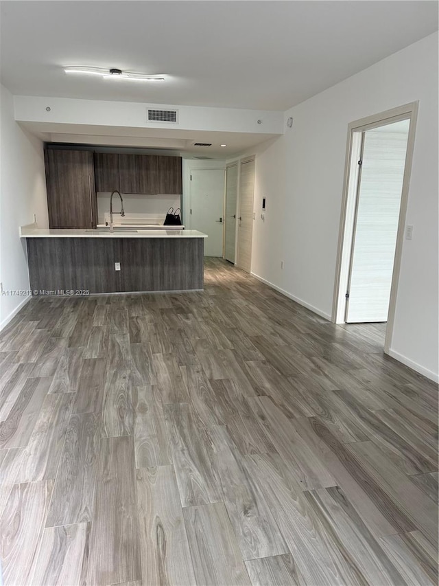 801 S Miami Ave Unit 1808, Miami, FL 33130 - unfurnished living room with wood finished floors