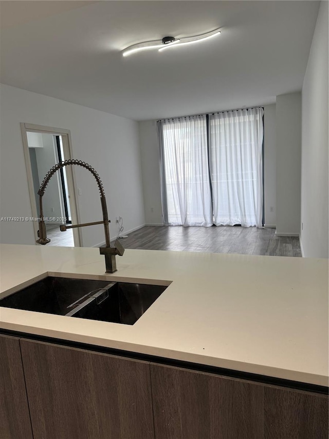 801 S Miami Ave Unit 1808, Miami, FL 33130 - kitchen with wood finished floors and light countertops