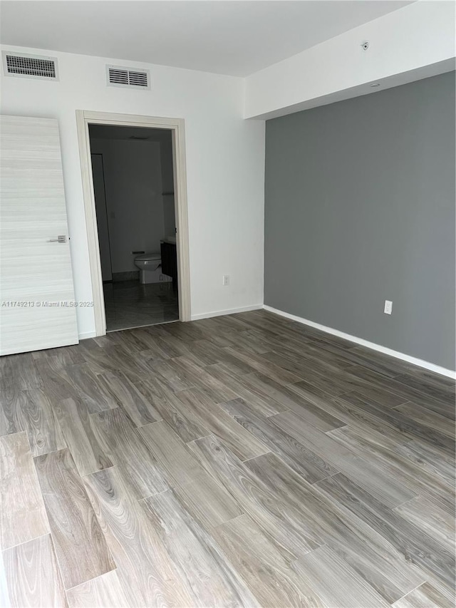 801 S Miami Ave Unit 1808, Miami, FL 33130 - empty room featuring wood finished floors and baseboards