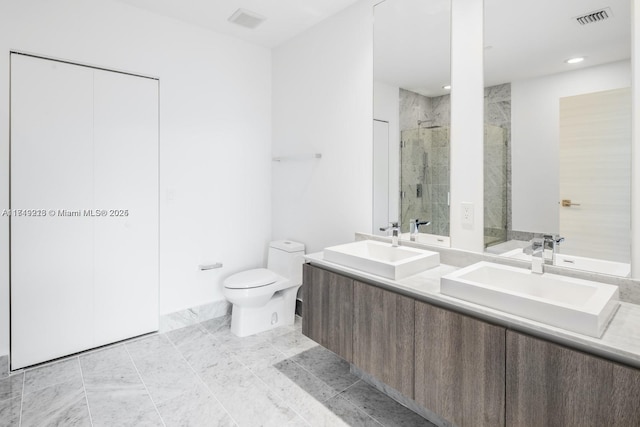 801 S Miami Ave Unit 1808, Miami, FL 33130 - bathroom with double vanity, a shower stall, and recessed lighting