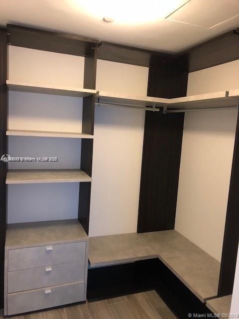 801 S Miami Ave Unit 1808, Miami, FL 33130 - walk in closet with wood finished floors