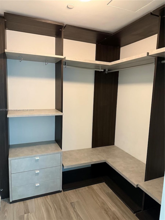 801 S Miami Ave Unit 1808, Miami, FL 33130 - spacious closet featuring wood finished floors