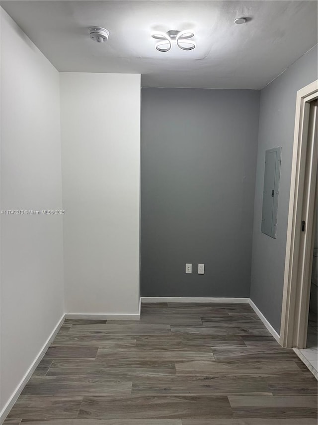 801 S Miami Ave Unit 1808, Miami, FL 33130 - spare room with electric panel, wood finished floors, and a smoke detector
