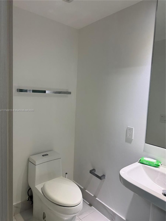801 S Miami Ave Unit 1808, Miami, FL 33130 - bathroom with toilet and tile patterned floors