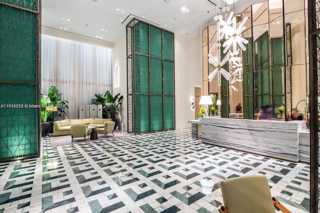 801 S Miami Ave Unit 1808, Miami, FL 33130 - welcome area with a towering ceiling and a chandelier