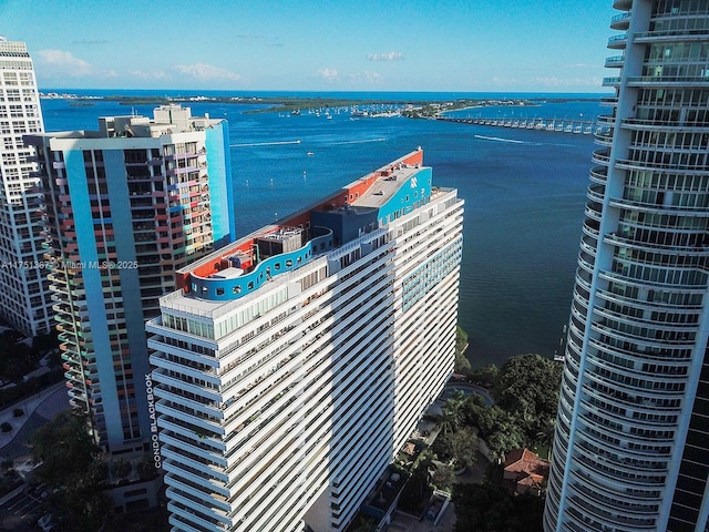 aerial view with a water view and a city view