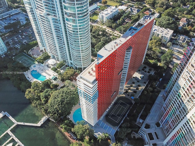 birds eye view of property with a view of city