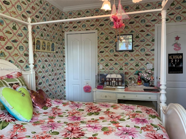 bedroom featuring a closet, crown molding, and wallpapered walls