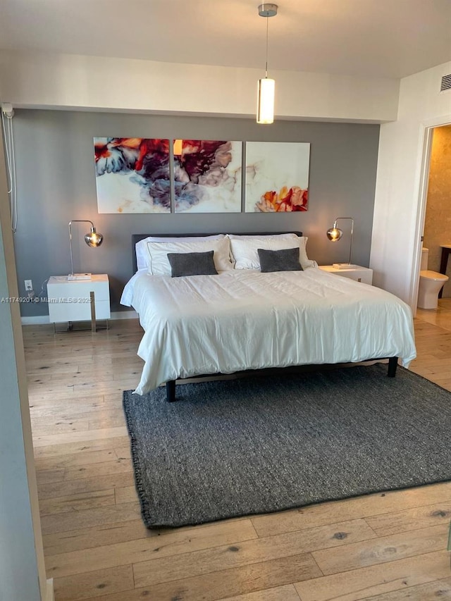 485 Brickell Ave Unit 2603, Miami, FL 33131 - bedroom with hardwood / wood-style flooring