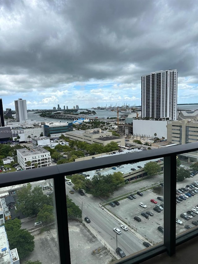 balcony with cooling unit and a city view