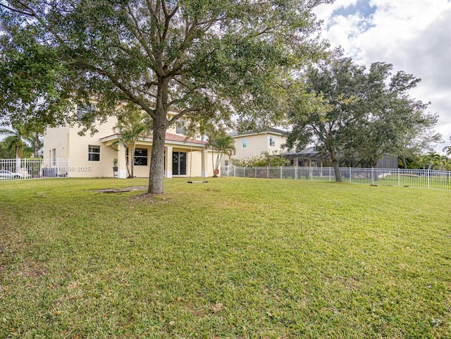 view of yard featuring fence