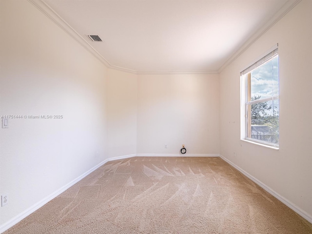 unfurnished room featuring light carpet, baseboards, visible vents, and crown molding