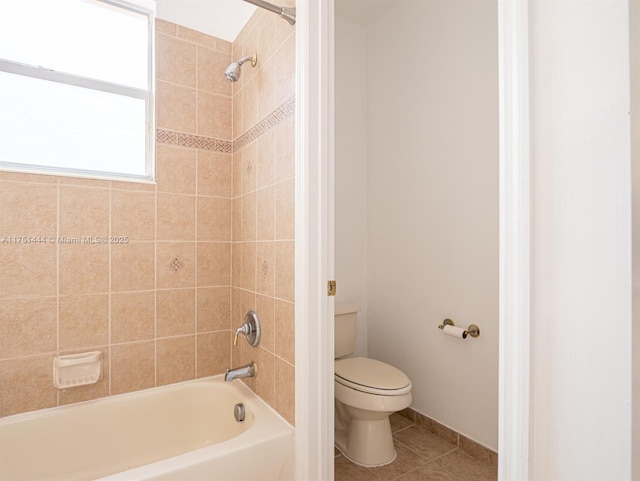 full bathroom with toilet, shower / bathtub combination, and tile patterned floors