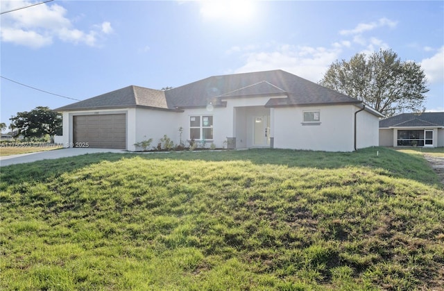 ranch-style home featuring a front lawn, driveway, an attached garage, and stucco siding