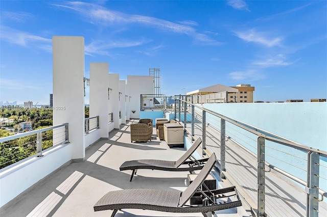 balcony featuring a view of city